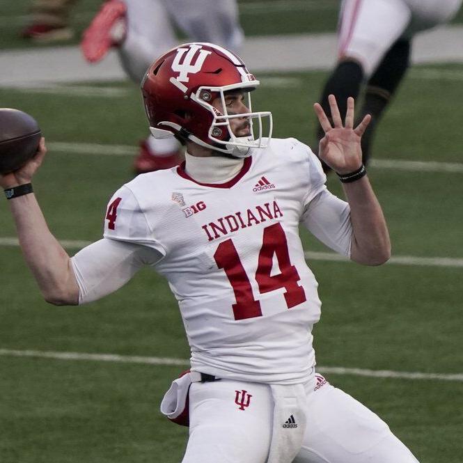 Indiana's Jack Tuttle throws a pass